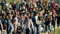 Sute de refugiaţi ar putea tranzita RM în calea spre UE